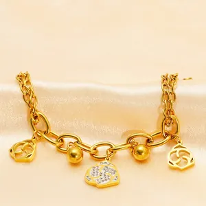 Chunky gold rose chain bracelet for women featuring floral pendants and white zircon stone