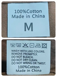 Detailed view of 100% cotton T-shirt collar label and fabric washing instructions tag
