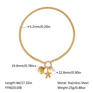 Detail view of a gold shell and starfish necklace with full size and weight measurements