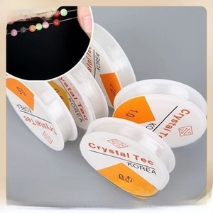 Multiple spools of elastic stretch cord for jewelry beading in 0.5mm 0.8mm and 1.0mm sizes