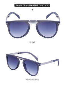 Macro detail of foldable sunglasses with sand transparent gray frame and metal hinges