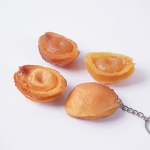 Realistic large abalone food model keychain accessory with detailed amber resin texture