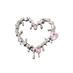 Y2K liquid metal heart mirror pendant with pink crystal gemstones on white background