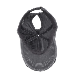 Vista interna con cuciture e etichetta 100% cotone del cappellino vintage con coda