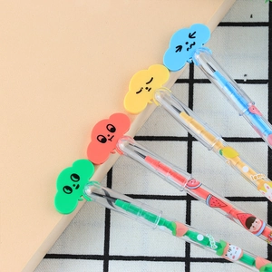 Detail of colorful stackable pencils with cloud toppers and fruit patterns for students
