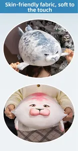Close-up of soft skin-friendly fabric and elasticity on sea seal plush toys