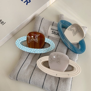 Creative planet hair claws with zircon stars, acetate shark clips in amber and blue