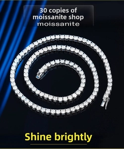 Detailed view of moissanite tennis chain necklace with 0.3ct stones in silver plating