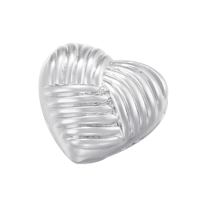 Detail view of heart-shaped silver charm with elegant cross-hatched textured pattern