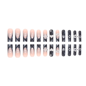 French black gradient press-on nails with silver heart star patterns and rhinestones