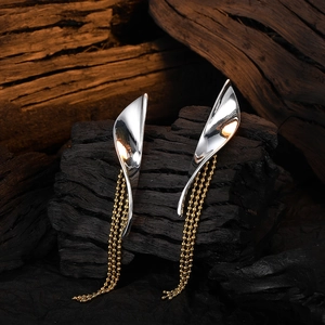 Minimalist bicolor willow leaf tassel chain earrings in silver and gold metal finish