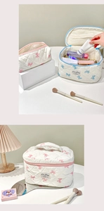 Détails du lot de trousses de maquillage en coton matelassé avec imprimés nœuds et filet
