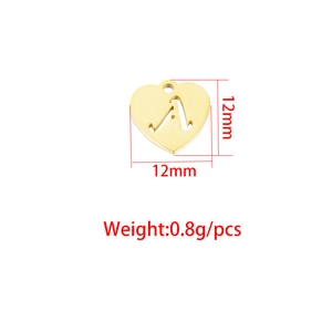 Macro view of 12mm gold stainless steel heart pendant with hollowed-out letter A detail