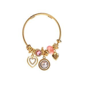 Adjustable gold twisted rope bracelet with heart charms and pink crystal stones