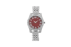 Macro detail of luxury ladies watch with red dial and crystal-encrusted silver band