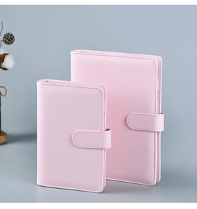 Detailed comparison of pink A5 and A6 PU leather notebooks with snap button closure