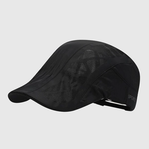 Detail of black sports flat cap showing breathable mesh panels and side sports lettering