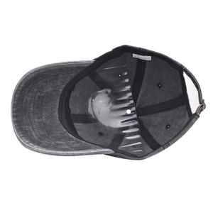 Detail view of cotton baseball cap interior showing the 100% cotton label and black sweatband