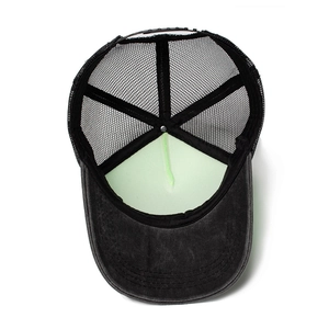 Washed black mesh trucker hat for men and women featuring vintage distressed cotton finish