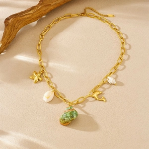 Gold stainless steel ocean necklace with green conch, starfish, and shell pendants