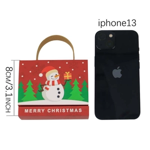 Red Christmas handle candy box with snowman illustration and Merry Christmas text