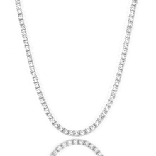 Detail of silver tennis necklace with round clear stones and reflective white background