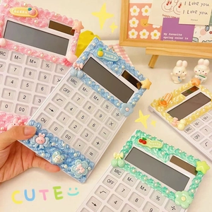 DIY cream glue calculator set with cute resin charms and cartoon charms in four colors