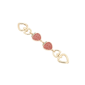 Golden metal bag chain extender with red enamel strawberries and heart-shaped clasps