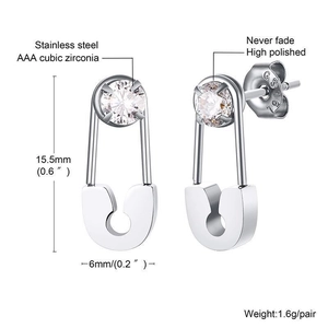 Macro detail of high polished safety pin earrings in stainless steel with AAA zircon