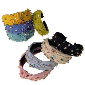 Baroque knotted headband with colorful rhinestones in seven assorted vibrant colors