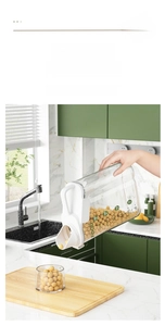 Detail of transparent cereal container with 1800ml scale and easy-pour funnel lid