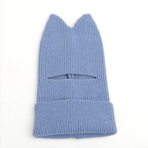 Detail view of blue knit cat ear balaclava showing thick texture and eye opening