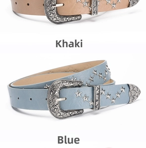 Detail of vintage star-studded belts with carved metal buckles in khaki and blue colors