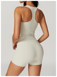 Macro shot of high-waist fitness shorts featuring seamless stitching in beige fabric