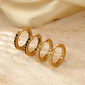 Fashionable gold titanium steel hoop earrings set with green and white zircons