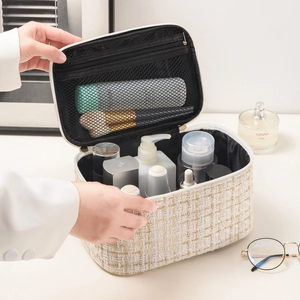 Quilted tweed makeup bag with large capacity and double gold zippers for travel storage