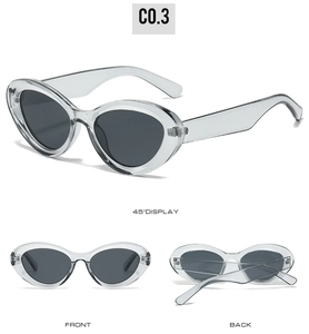 Three-angle display of cat-eye sunglasses in transparent grey frame and dark lenses