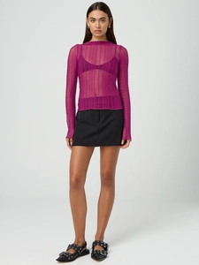 Detail of sheer fuchsia long sleeve top with vertical texture and ribbed design