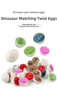 Macro detail of dinosaur matching twist eggs with colorful internal dinosaur molds