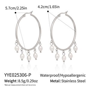 Detail of stainless steel hoop earrings with pearls and 5.7cm diameter measurement
