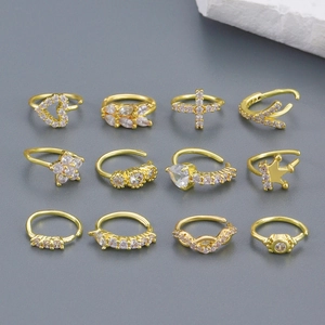 Set of 12 gold plated nose rings and cartilage studs with crystal heart and crown designs