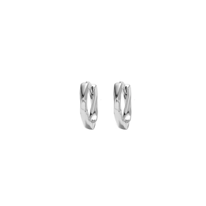 Detailed macro view of silver stud earrings with a stylish twisted molten metal texture
