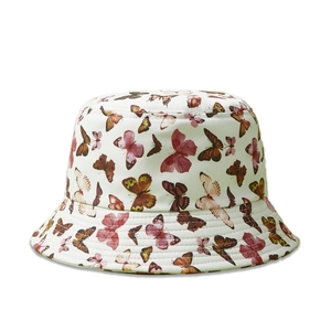 Detail view of white bucket hat with colorful butterfly print and twill cotton texture