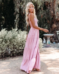 Detail of pink striped summer maxi dress featuring a tiered skirt and lightweight fabric