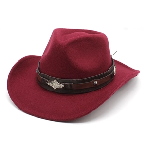 Close-up of wine red felt cowboy hat featuring faux leather band and silver metal accents