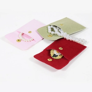 Pochettes à bijoux en velours épais avec boutons-pression pour colliers et bagues en trois couleurs
