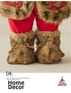 Close-up of Santa doll featuring brown plush boots and red velvet trousers texture