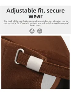 Detail of adjustable metal buckle on brown baseball cap for secure and custom fit