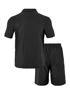 Detail of men's black knit waffle texture fabric on short sleeve polo and shorts set