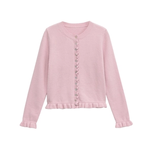 Pink knit cardigan for girls featuring ruffle trim detailing and button front closure